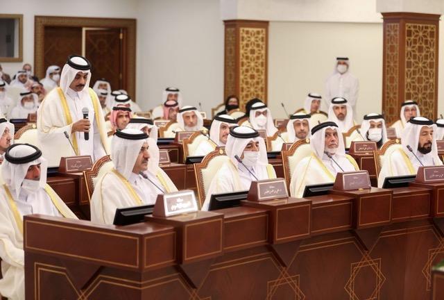 A group of tribal men sitting together, symbolizing the continued influence of tribes in shaping Gulf societies and politics, preserving traditions while impacting modern governance.