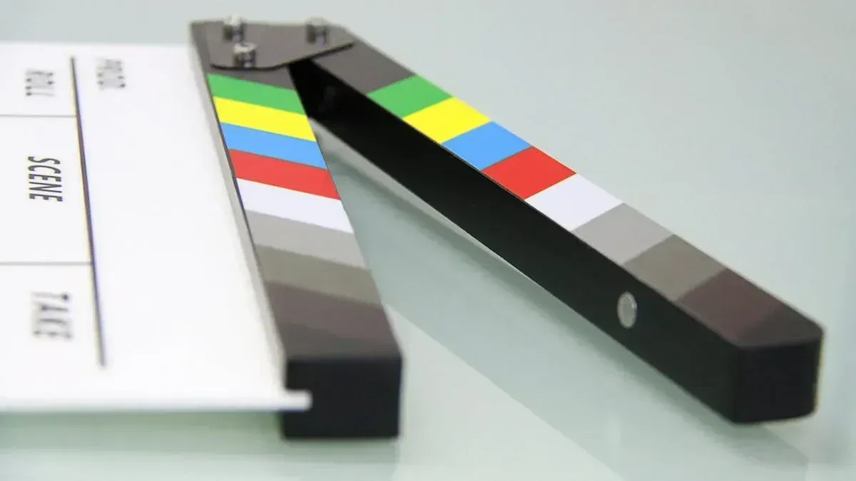 A film reel or movie scene, symbolizing the growing film industry in Saudi Arabia, where films and movies once banned are now becoming a major part of the cultural scene.
