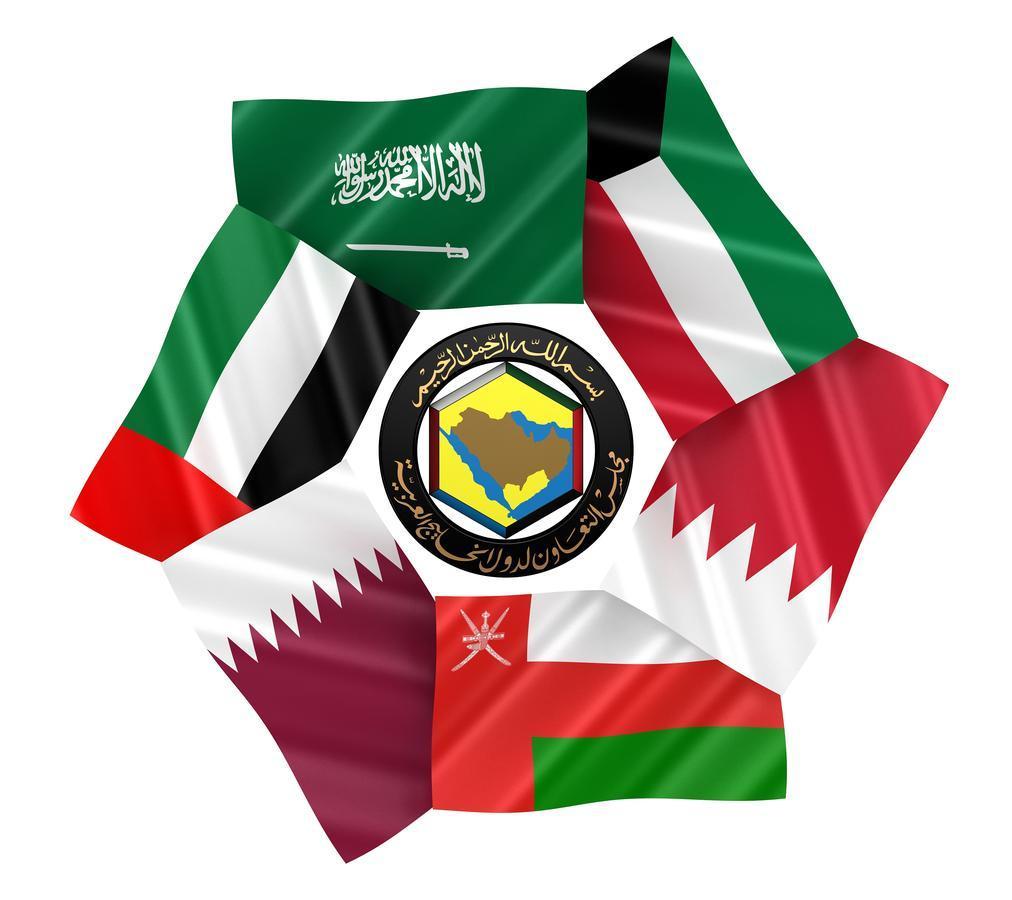 Flags of the Gulf Cooperation Council (GCC) member states—Saudi Arabia, Kuwait, Bahrain, Qatar, United Arab Emirates, and Oman—arranged in a circular formation around the GCC emblem. (Source: Shutterstock)