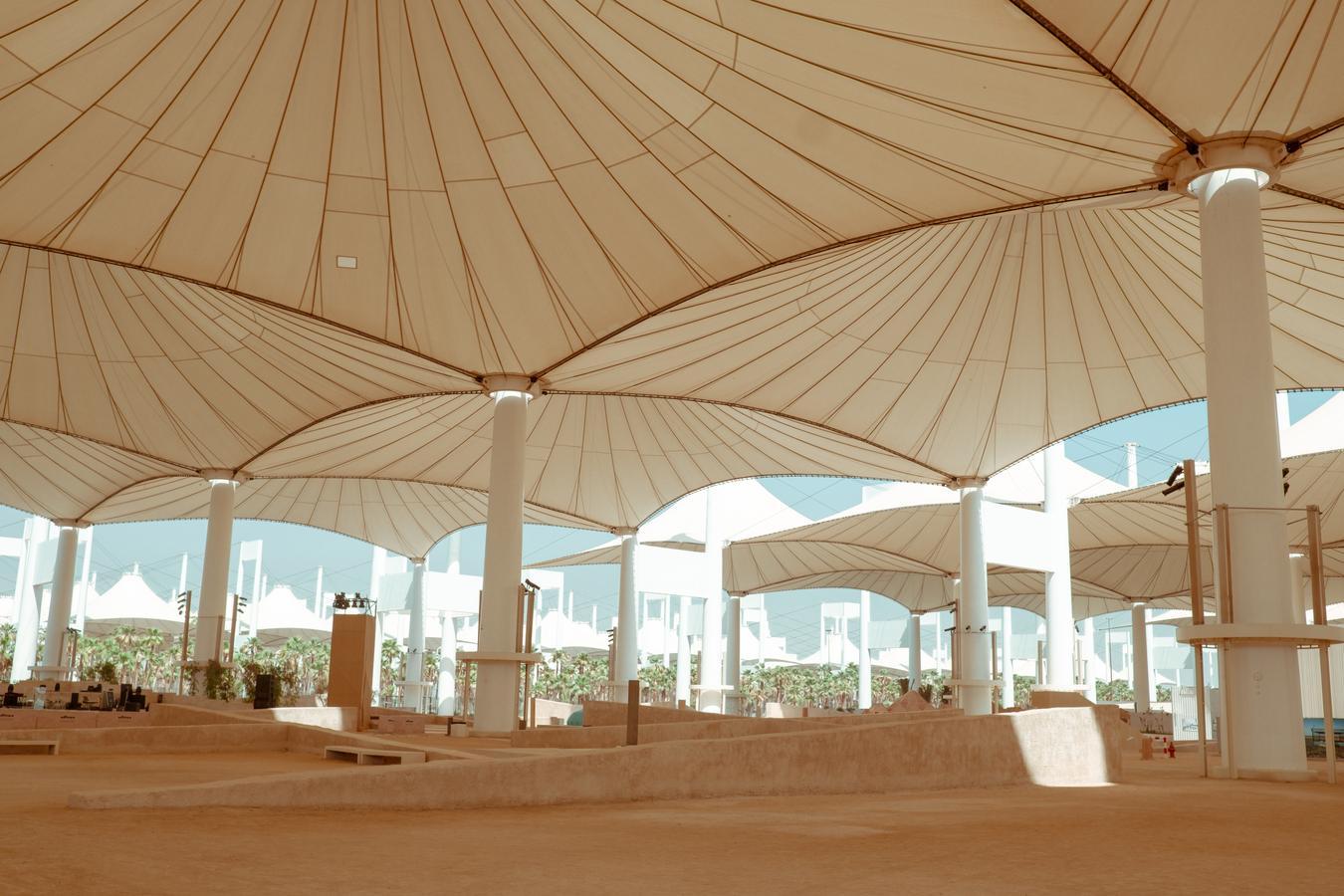 Jeddah's first Biennale held at the historic Old Jeddah Airport, showcasing Saudi art and culture."  This version removes the source attribution (unnecessary in alt text) and ensures the focus remains on the event and its significance.