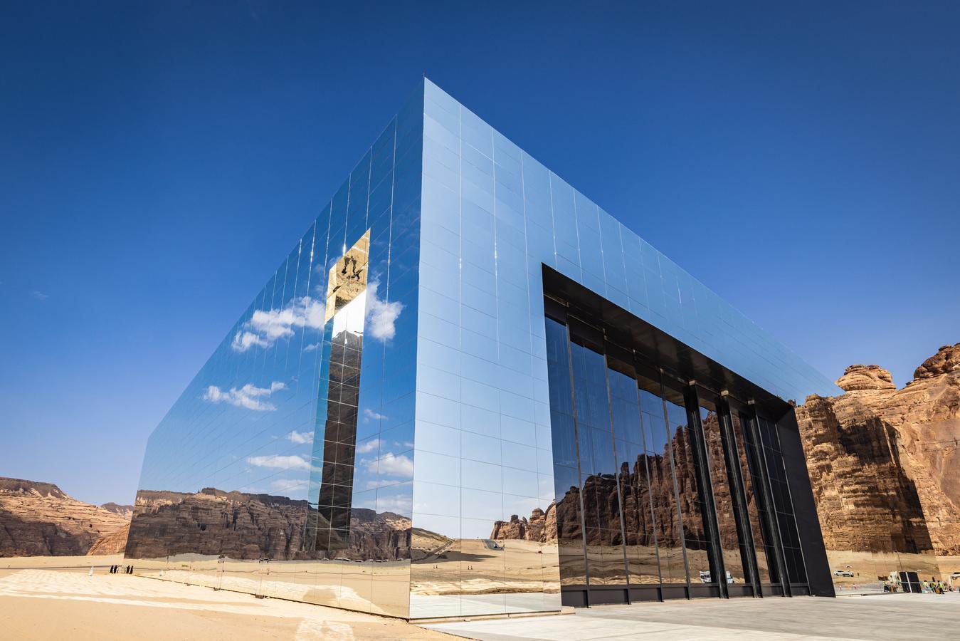 Maraya, a mirrored concert hall in Ashar Valley, Al-Ula, reflecting the desert landscape and hosting cultural events in Saudi Arabia.