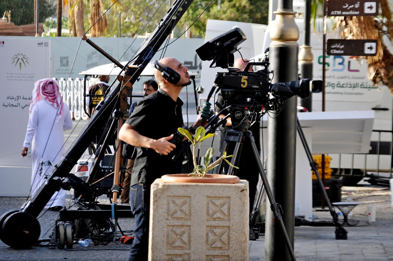 Saudi film crew filming on location in Jeddah’s Al-Balad Historic District, a historic area often used for television and independent productions.