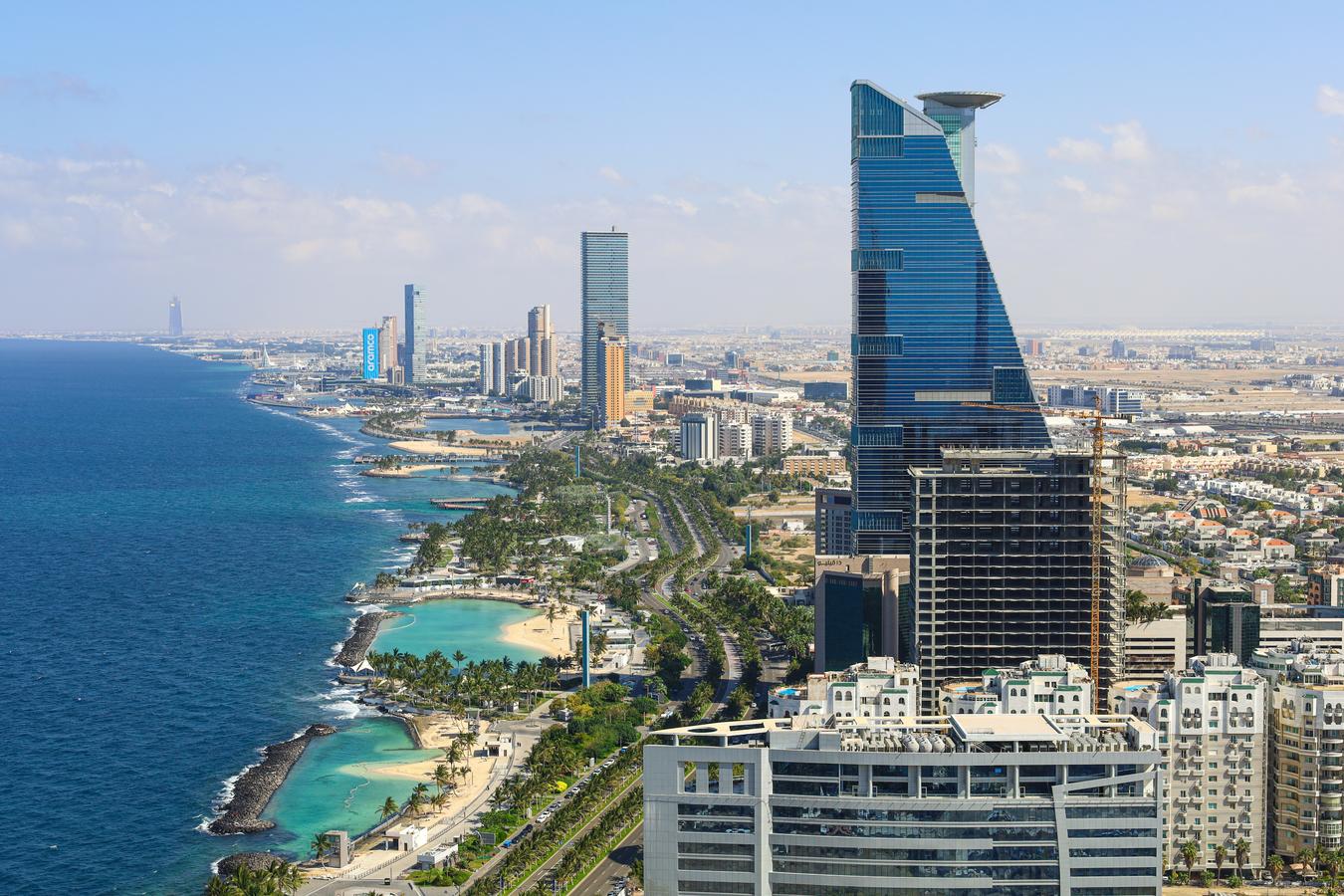 Jeddah skyline with modern skyscrapers and Red Sea coastline, representing Saudi Arabia’s economic growth and the importance of cultural insight for startups entering the market.